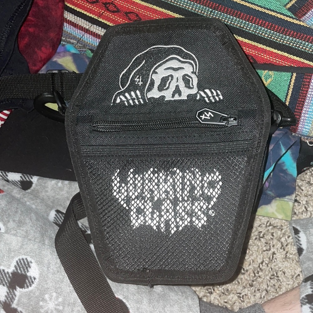 Black coffin shaped lurking class cross body bag